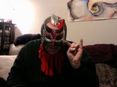 My boyfriend, sporting a fabulous Lucha mask I brought home!